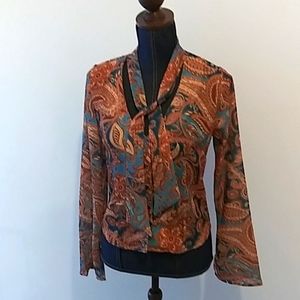 Dressy blouse with tie. Brown and blue paisley with bell sleeves. Size medium